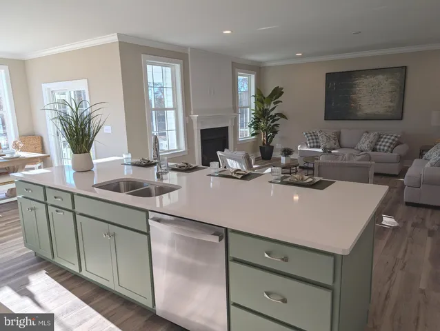 a kitchen with sink and window
