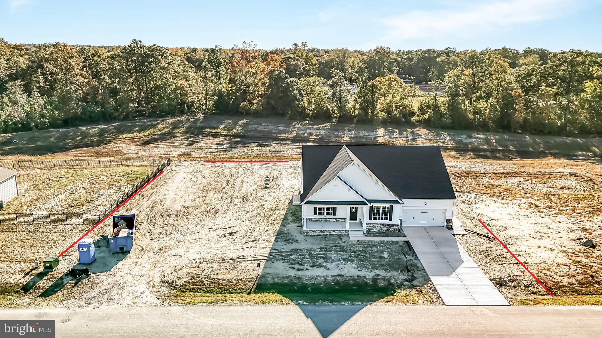 22012 Antlered Way Georgetown, DE 19947 - Photo 55 of 59 a front view of a house with a yard