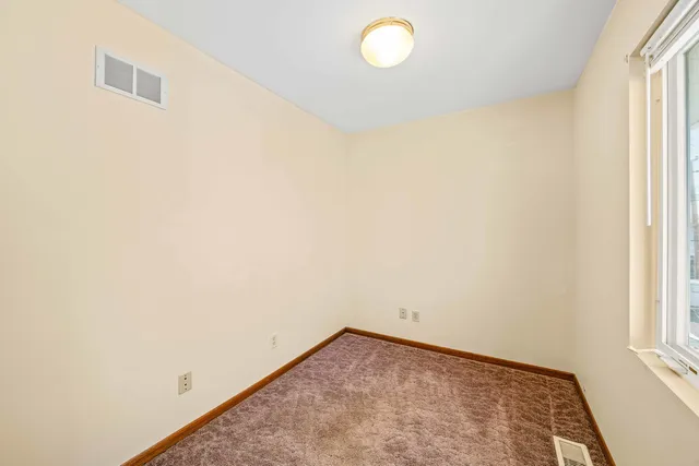 a view of a storage room with an entryway