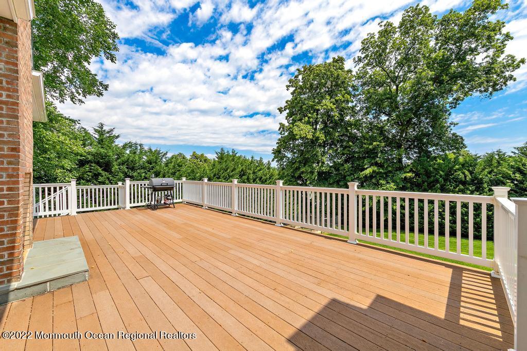 3 Sugar Maple Lane Rumson, NJ 07760 - Photo 12 of 53 a view of deck with a wooden floor and fence