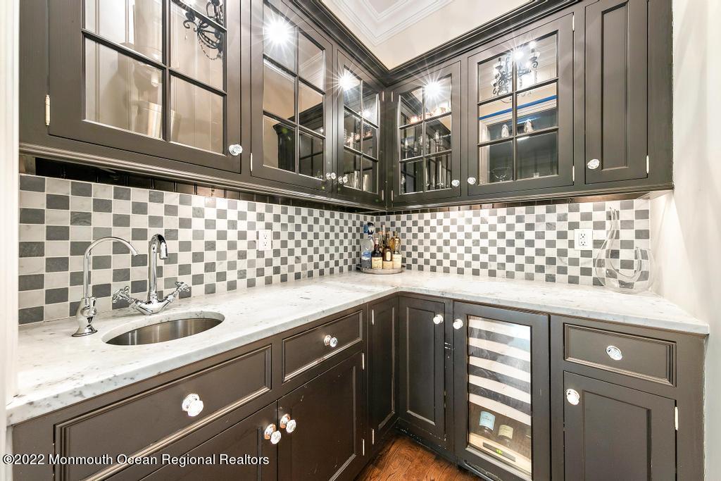 3 Sugar Maple Lane Rumson, NJ 07760 - Photo 14 of 53 a kitchen with a sink and cabinets