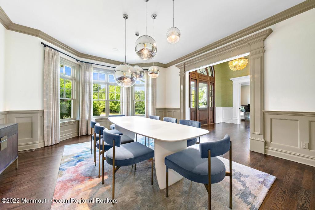 3 Sugar Maple Lane Rumson, NJ 07760 - Photo 15 of 53 a view of a dining room with furniture wooden floor and chandelier