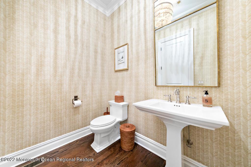 3 Sugar Maple Lane Rumson, NJ 07760 - Photo 19 of 53 a spacious bathroom with a sink a toilet and a mirror