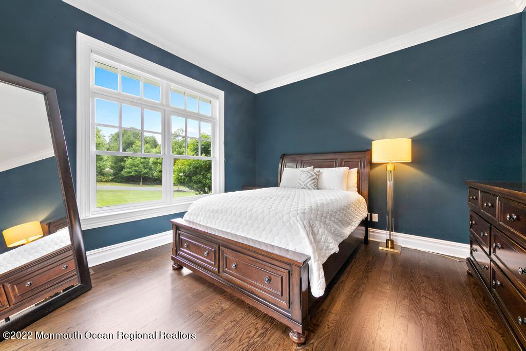 3 Sugar Maple Lane Rumson, NJ 07760 - Photo 21 of 53 a bed sitting in a bedroom next to a window
