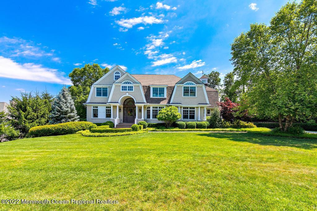 3 Sugar Maple Lane Rumson, NJ 07760 - Photo 3 of 53 a front view of a house with swimming pool having outdoor seating