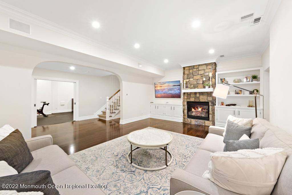 3 Sugar Maple Lane Rumson, NJ 07760 - Photo 35 of 53 a living room with furniture and a table