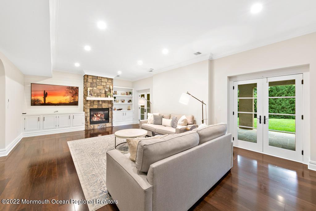 3 Sugar Maple Lane Rumson, NJ 07760 - Photo 37 of 53 a living room with furniture and a flat screen tv