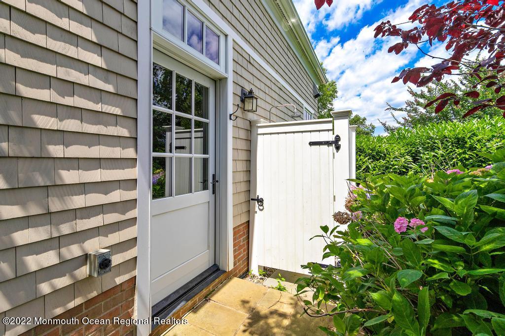 3 Sugar Maple Lane Rumson, NJ 07760 - Photo 49 of 53 a view of yellow house with a window