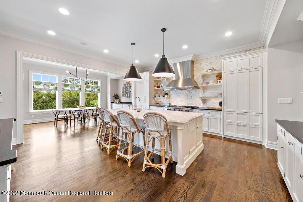 3 Sugar Maple Lane Rumson, NJ 07760 - Photo 8 of 53 a large kitchen with a table and chairs