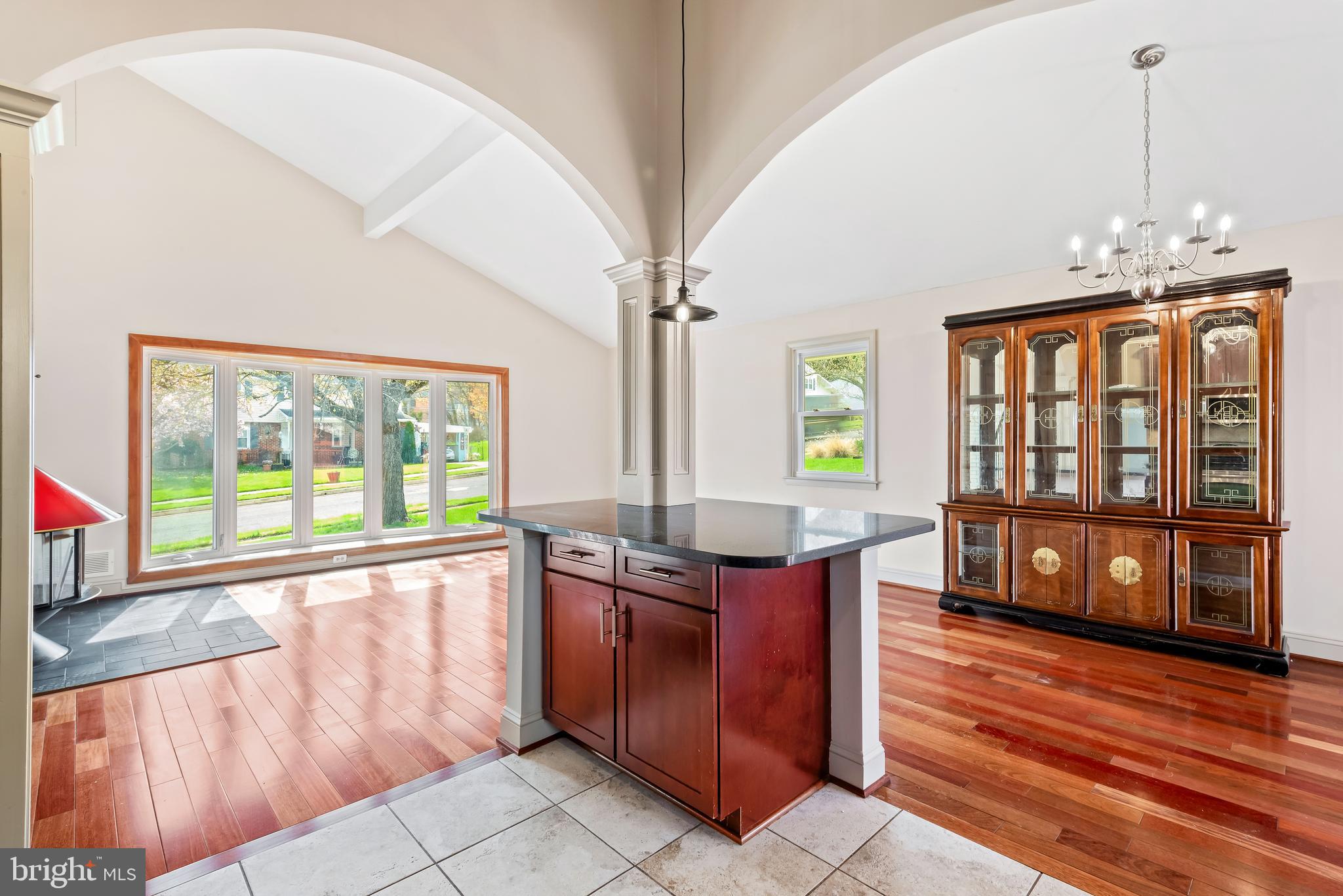 947 Beaverbank Circle Towson, MD 21286 - Photo 16 of 63 a kitchen with stainless steel appliances granite countertop a stove and a wooden cabinets