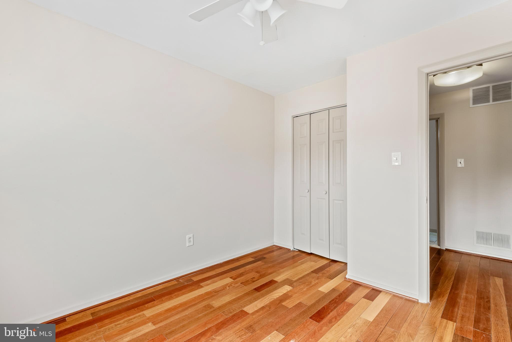 947 Beaverbank Circle Towson, MD 21286 - Photo 28 of 63 a view of empty room with wooden floor