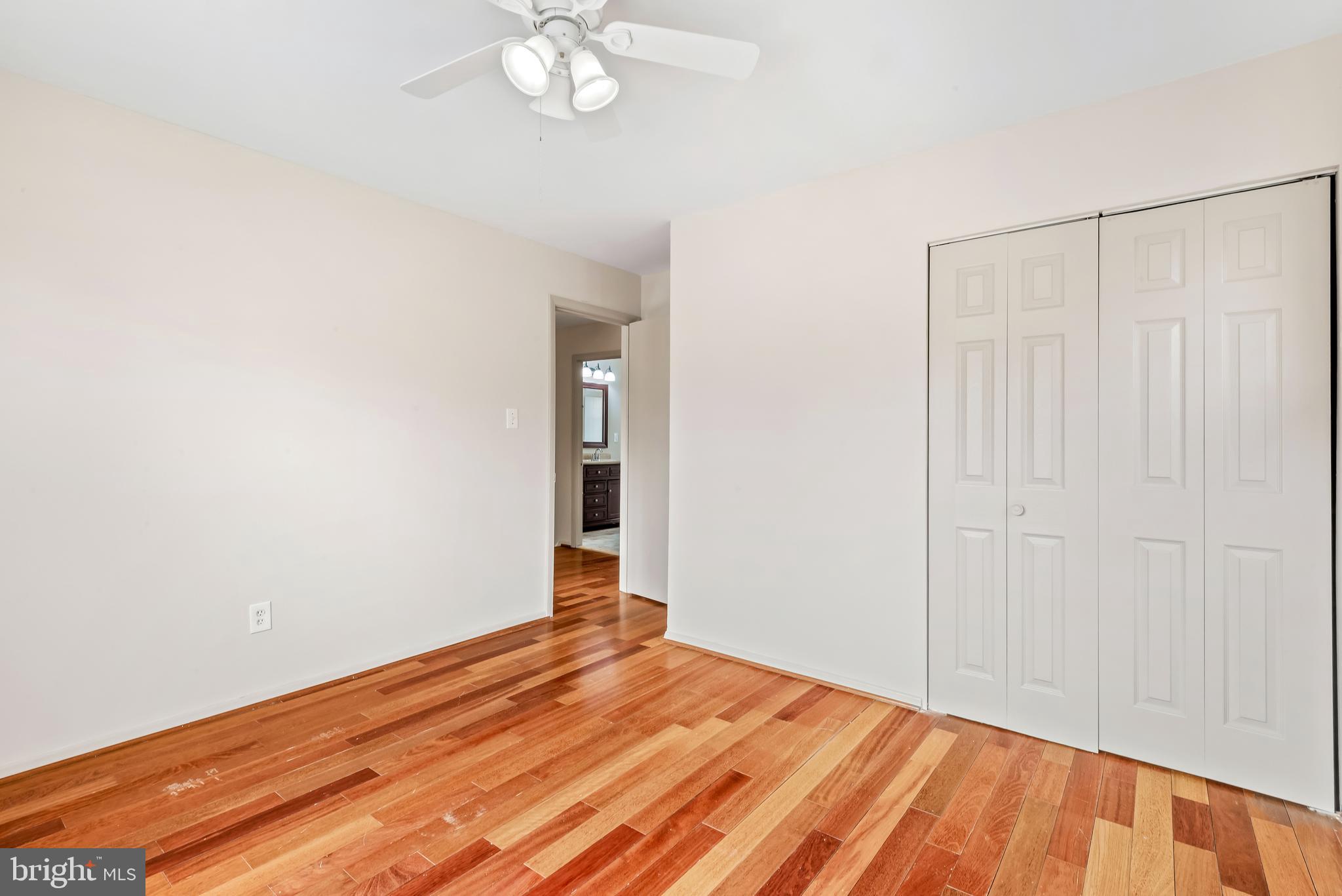 947 Beaverbank Circle Towson, MD 21286 - Photo 30 of 63 a view of a room with wooden floor and fan