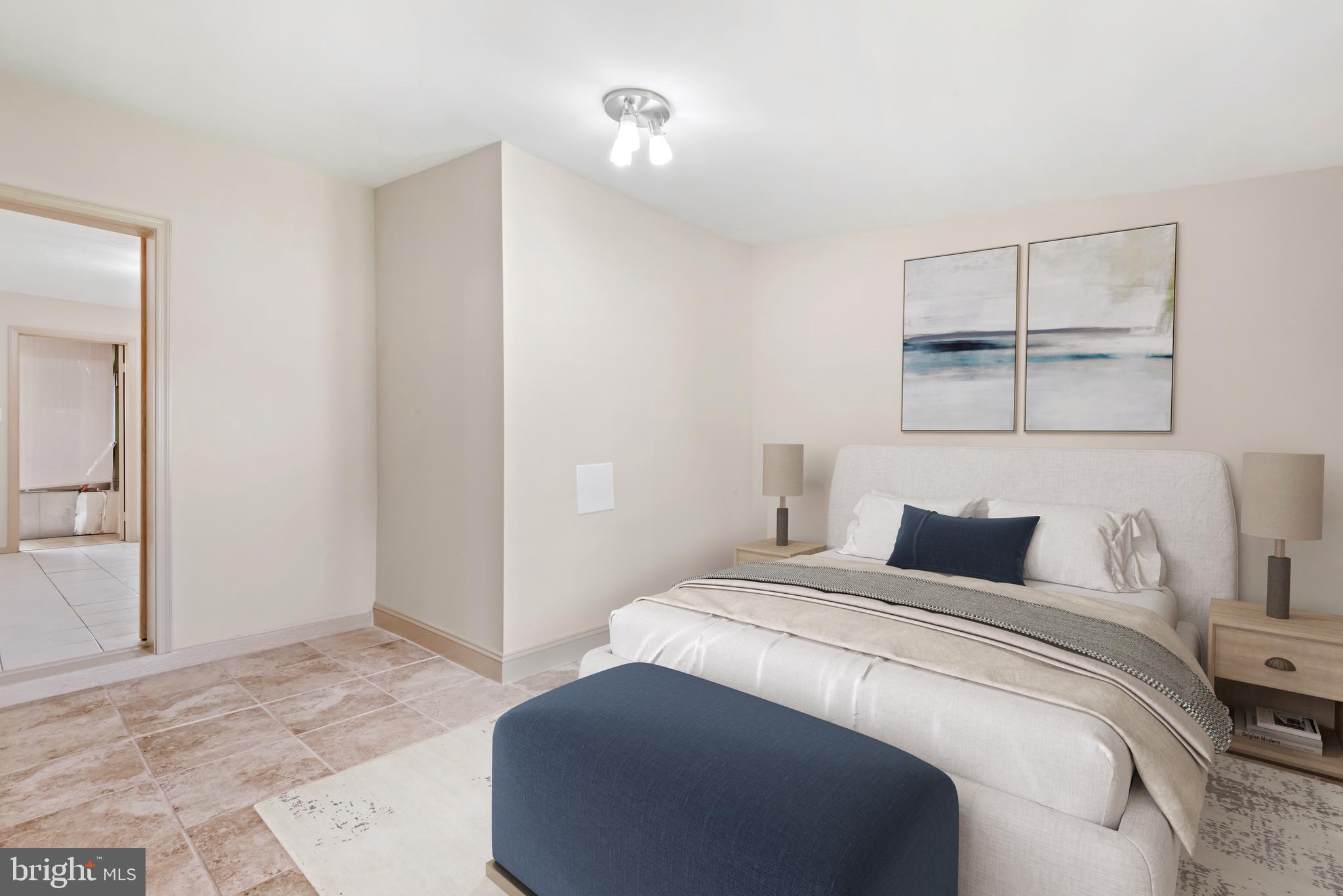 947 Beaverbank Circle Towson, MD 21286 - Photo 42 of 63 a bedroom with a bed and a painting on the wall