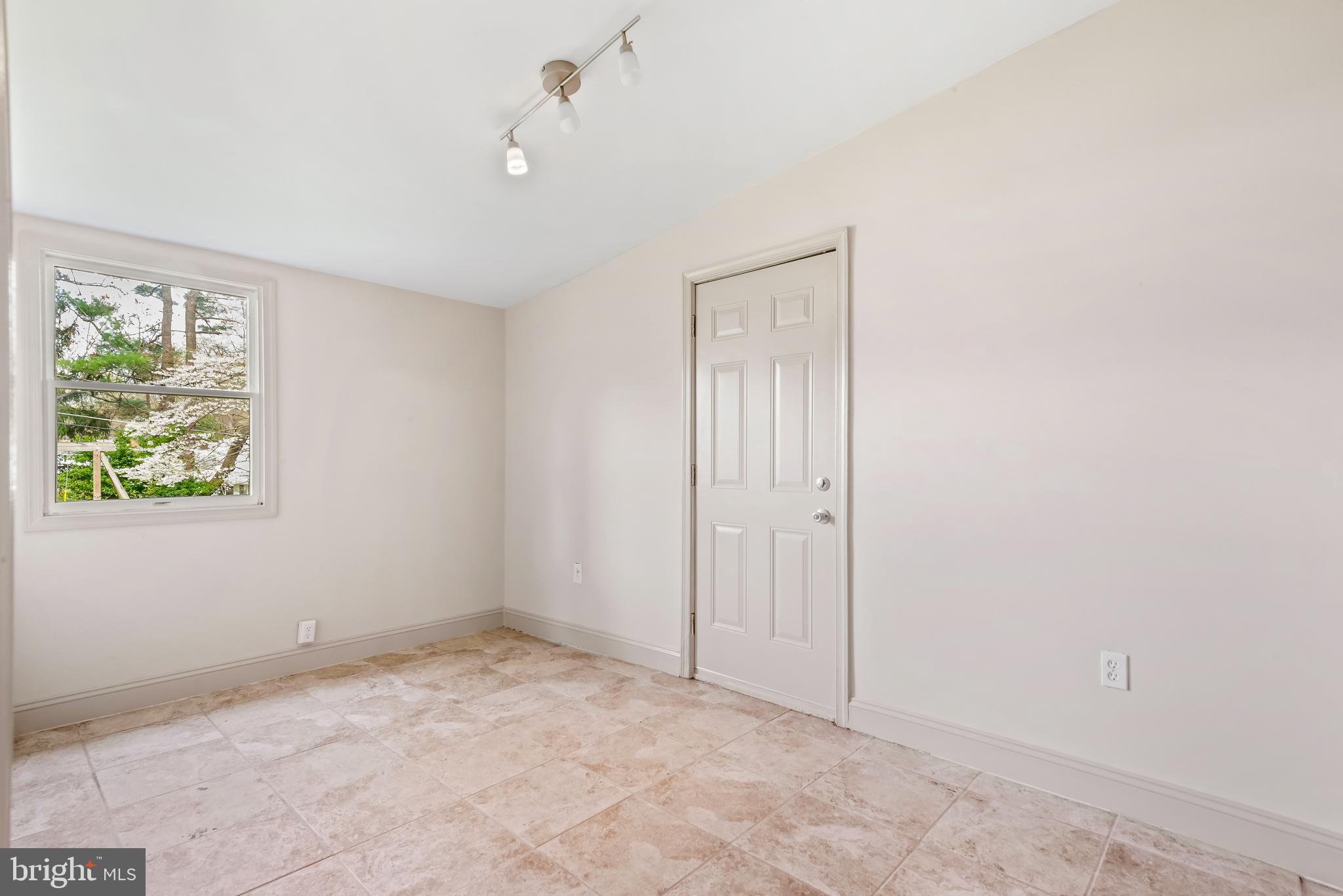 947 Beaverbank Circle Towson, MD 21286 - Photo 45 of 63 a view of an empty room with a window
