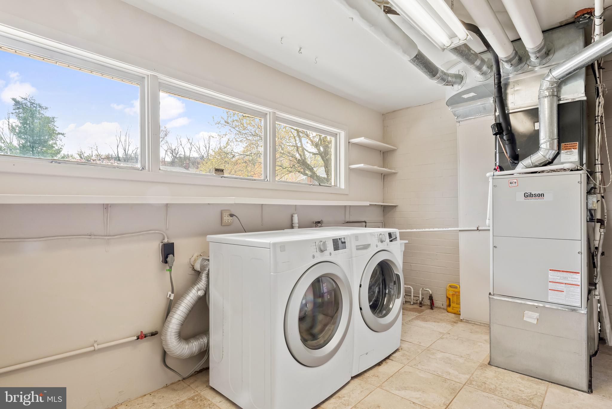 947 Beaverbank Circle Towson, MD 21286 - Photo 47 of 63 a utility room with dryer and washer