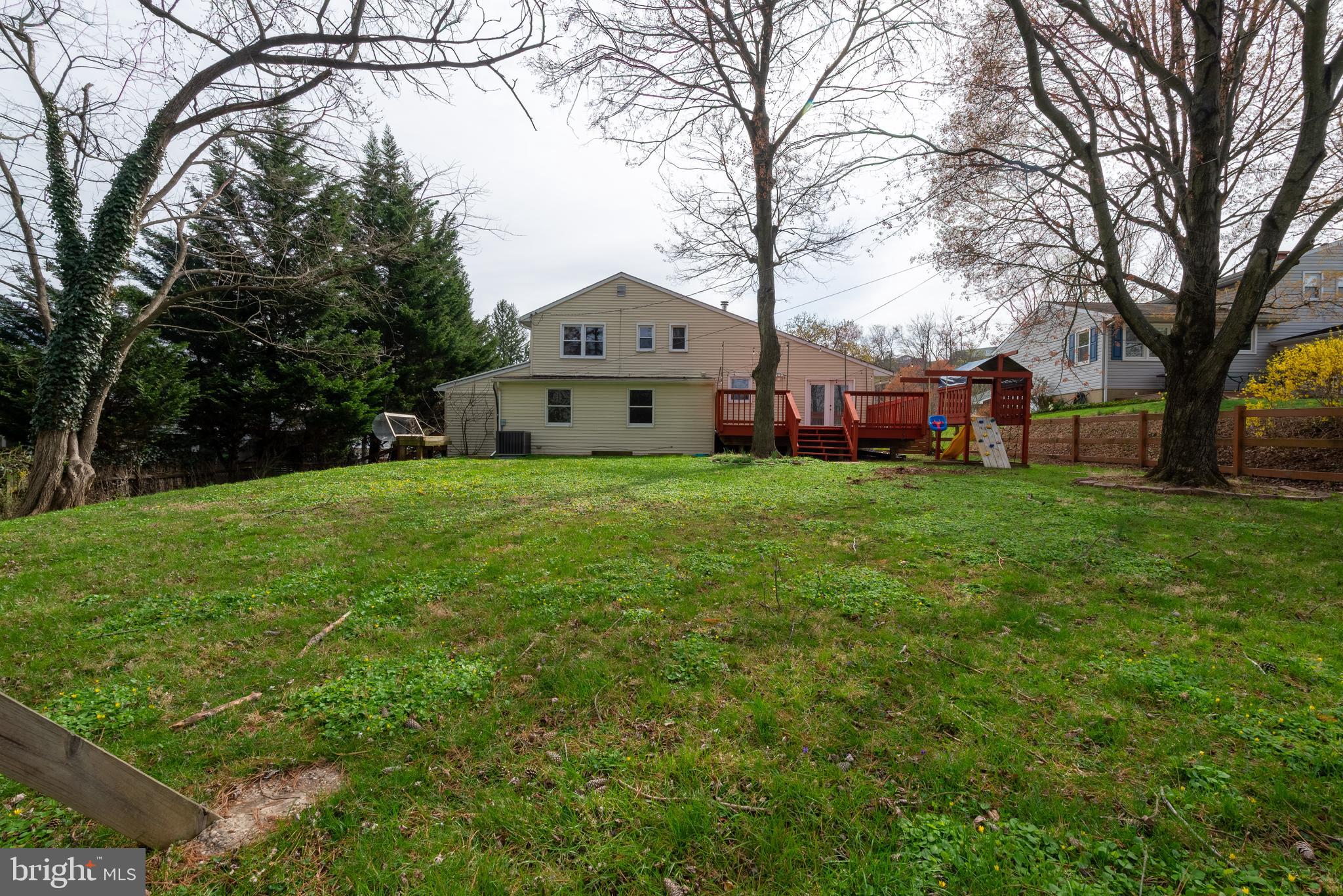 947 Beaverbank Circle Towson, MD 21286 - Photo 56 of 63 a view of a house with a yard and large trees