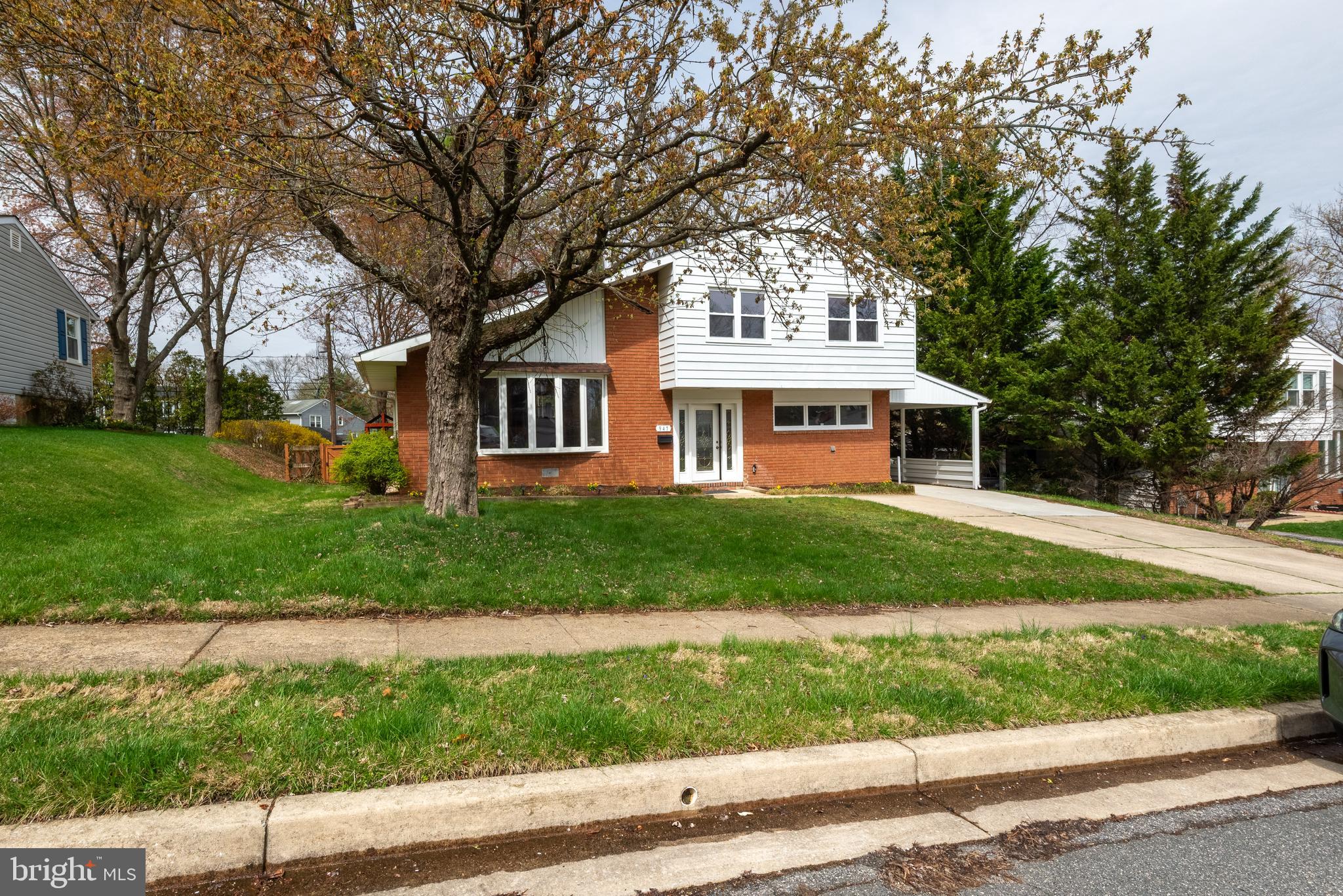 947 Beaverbank Circle Towson, MD 21286 - Photo 59 of 63 front view of a house with a yard