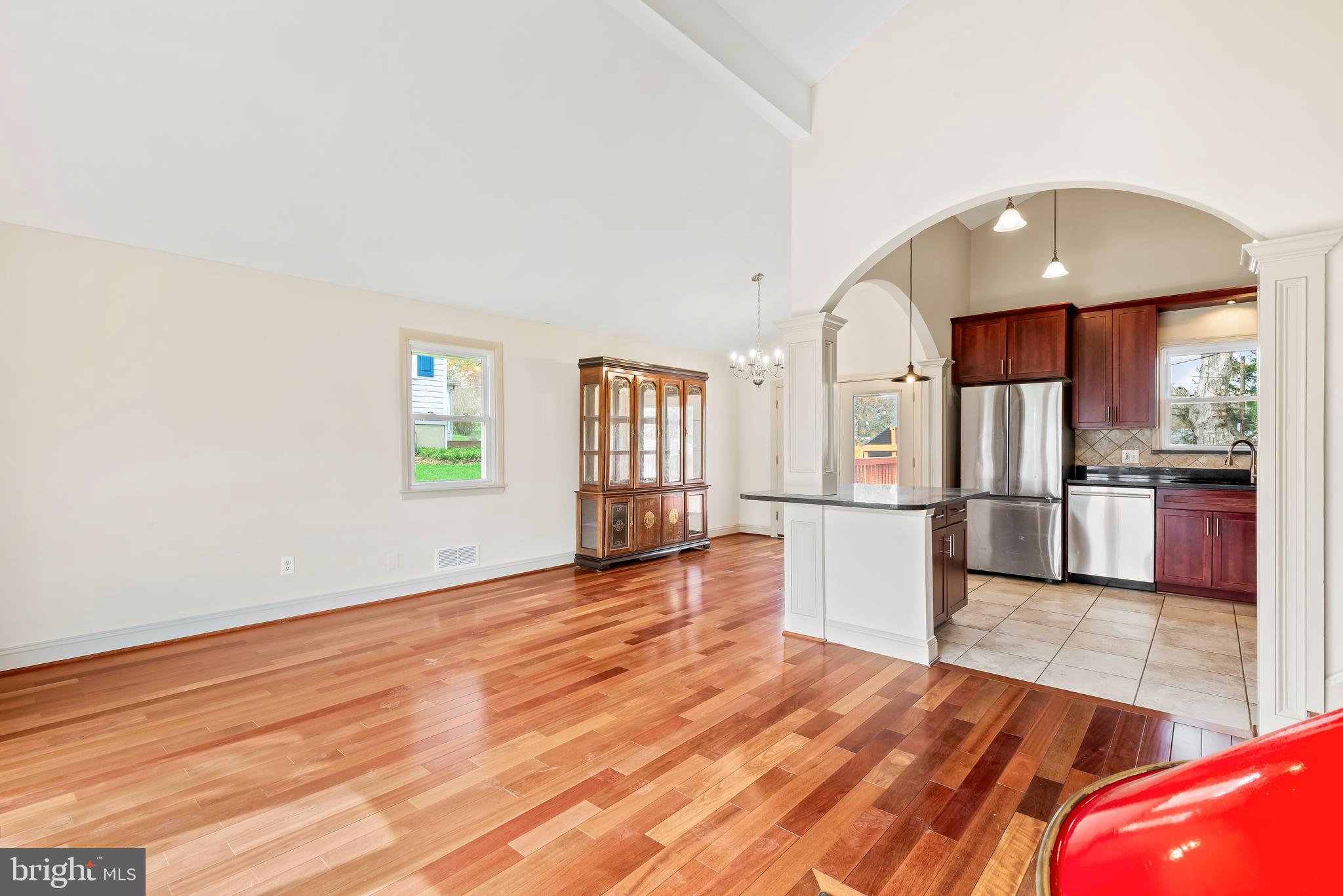 947 Beaverbank Circle Towson, MD 21286 - Photo 7 of 63 a view of a kitchen with a sink and refrigerator