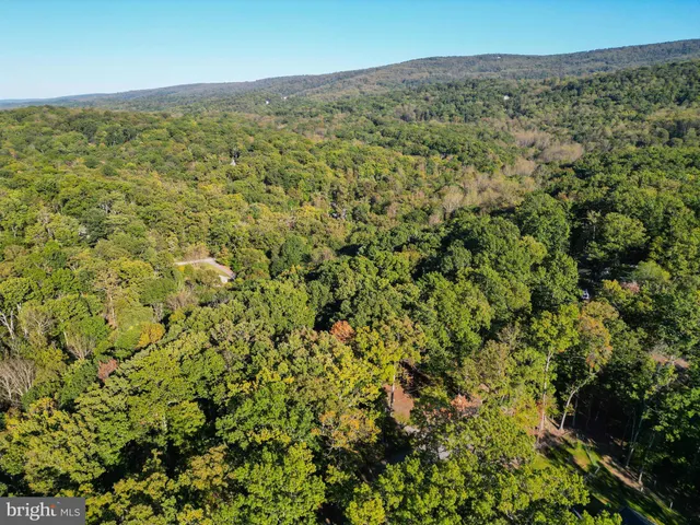 a bathroom with a sink a vanity and a mirror