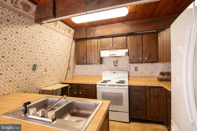 a view of balcony with wooden floor