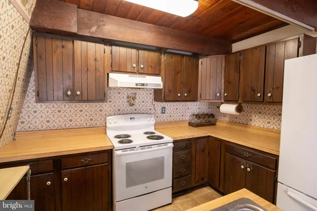 a front view of a house with yard