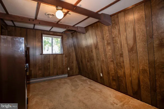 a view of outdoor space with chairs and couch