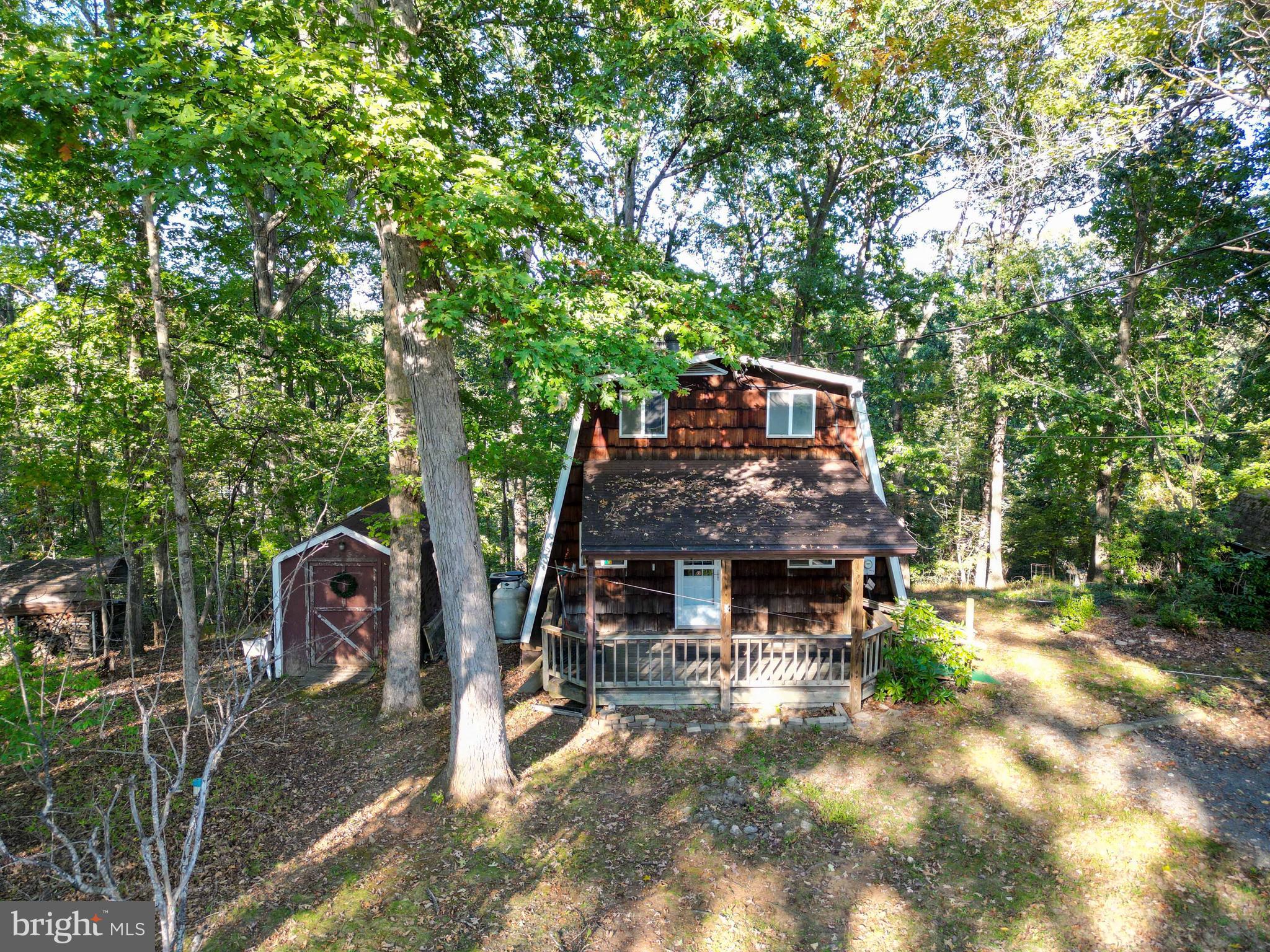 458 Hobbs Knob Road Front Royal, VA 22630 - Photo 4 of 94 a front view of a house with a yard