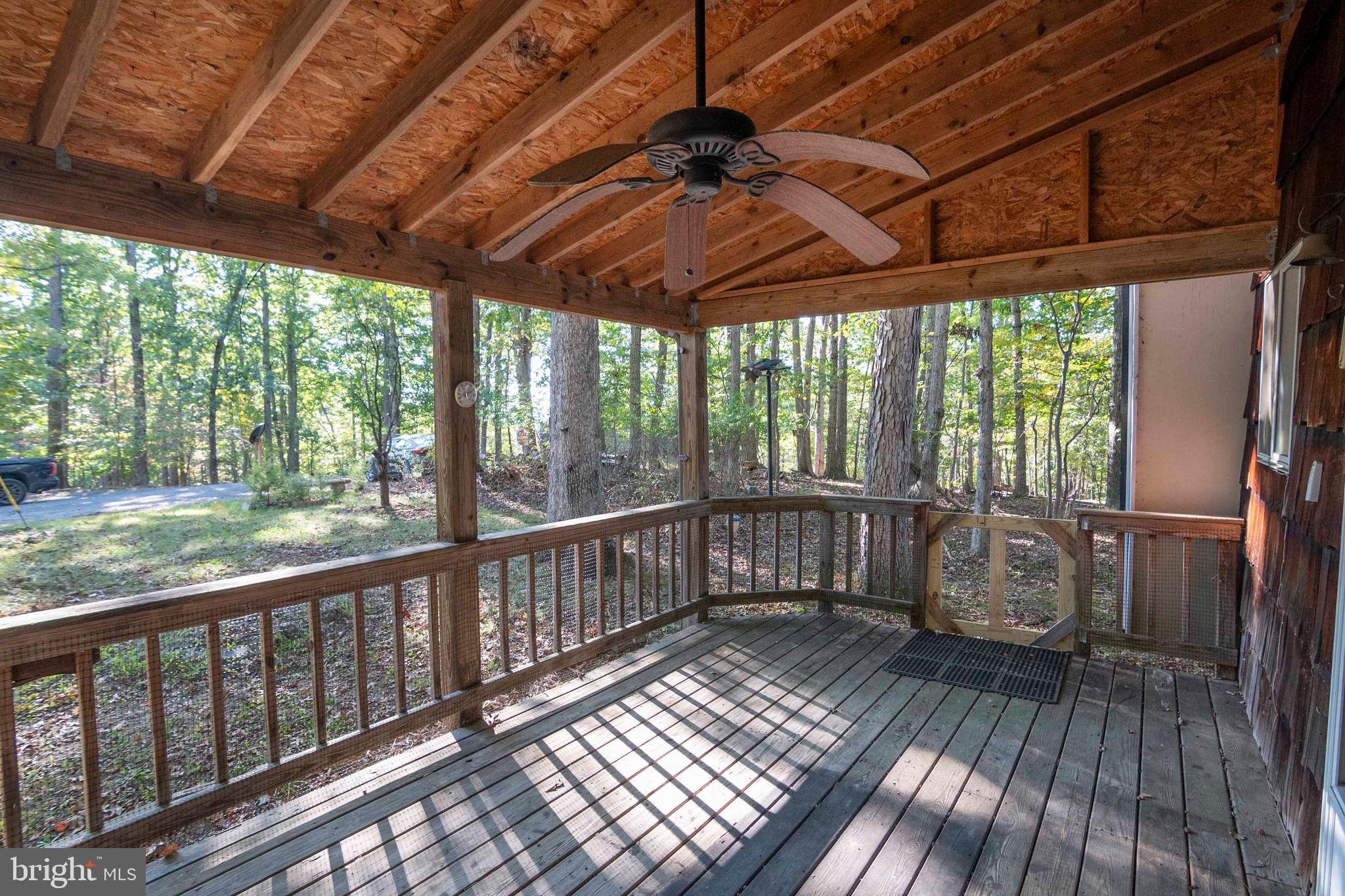 458 Hobbs Knob Road Front Royal, VA 22630 - Photo 42 of 94 a view of balcony with wooden floor