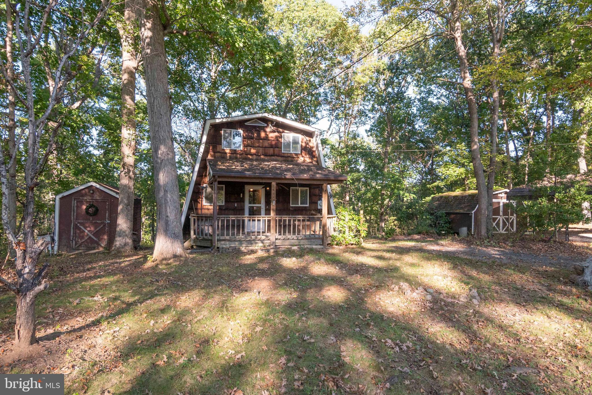 458 Hobbs Knob Road Front Royal, VA 22630 - Photo 47 of 94 a front view of a house with yard