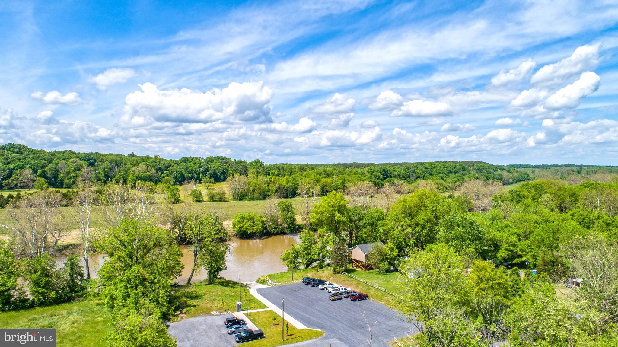 458 Hobbs Knob Road Front Royal, VA 22630 - Photo 52 of 94 a view of a lake with houses in the back