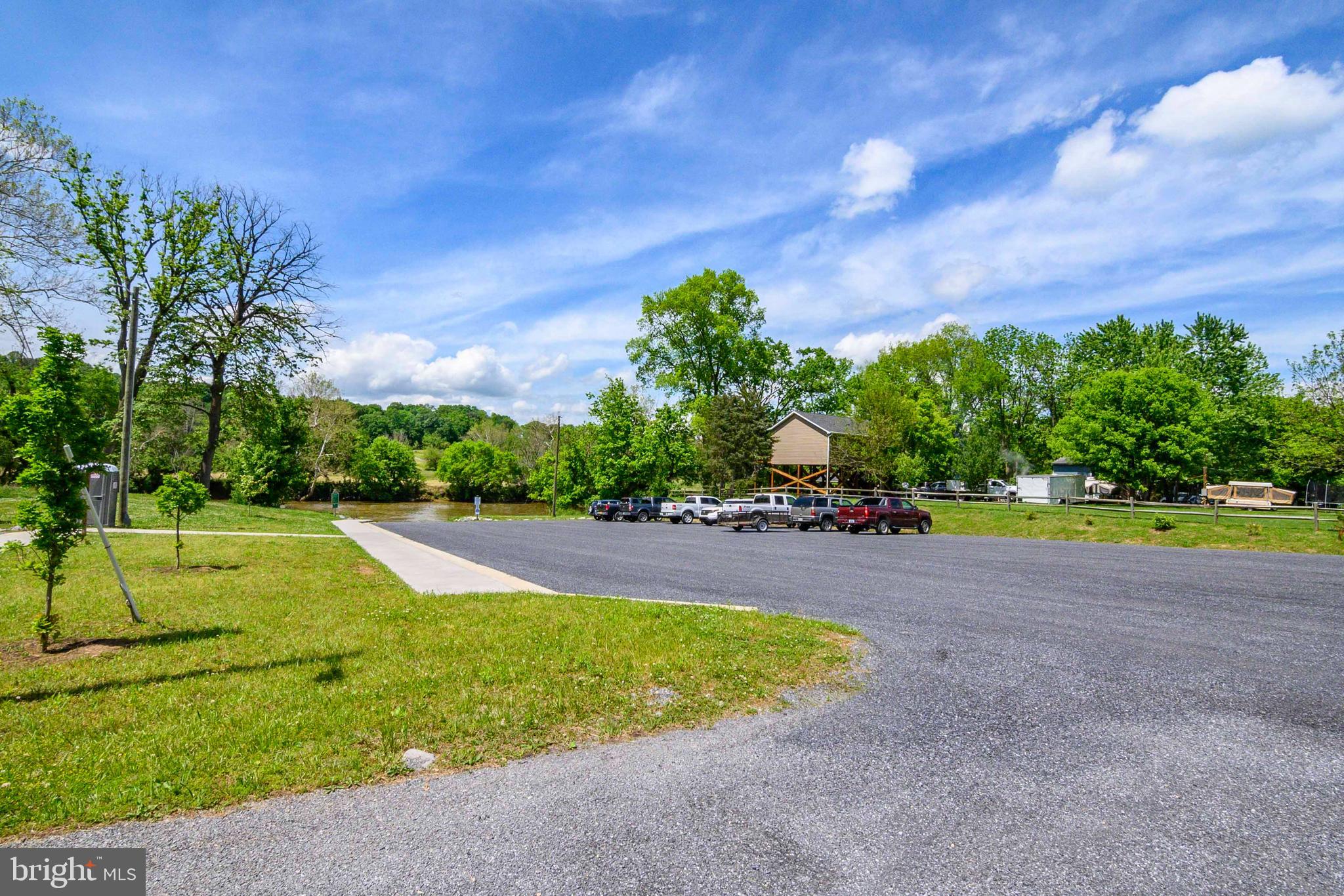 458 Hobbs Knob Road Front Royal, VA 22630 - Photo 55 of 94 a view of a swimming pool with a yard