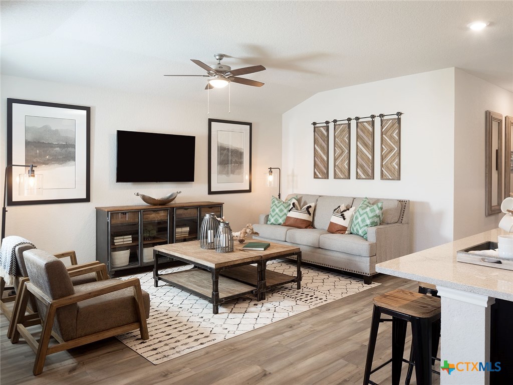 125 Dakota Ridge Cibolo, TX 78108 - Photo 4 of 13 a living room with furniture and a flat screen tv