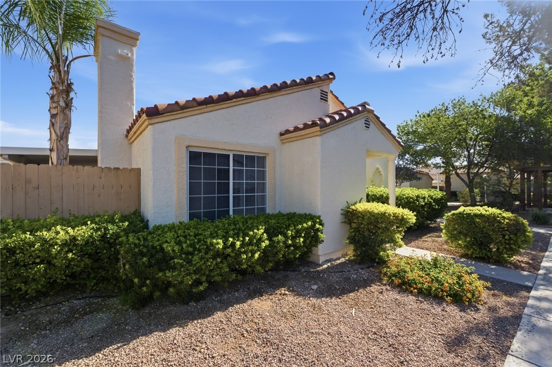 5449 Bugle Way, Unit 104 Las Vegas, NV 89108 - Photo 4 of 33 This charming home offers classic architectural details and a welcoming exterior in a vibrant community.