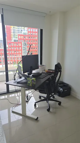 a view of workspace with gym equipment