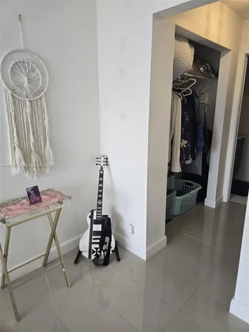 a view of hallway with livingroom