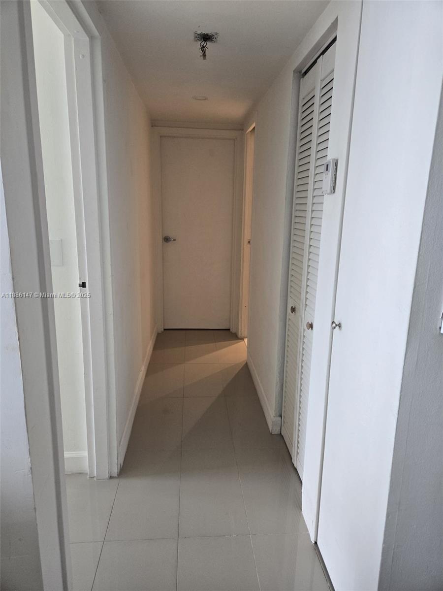 200 Southeast 15th Road, Unit 8J Miami, FL 33129 - Photo 20 of 20 a view of a hallway