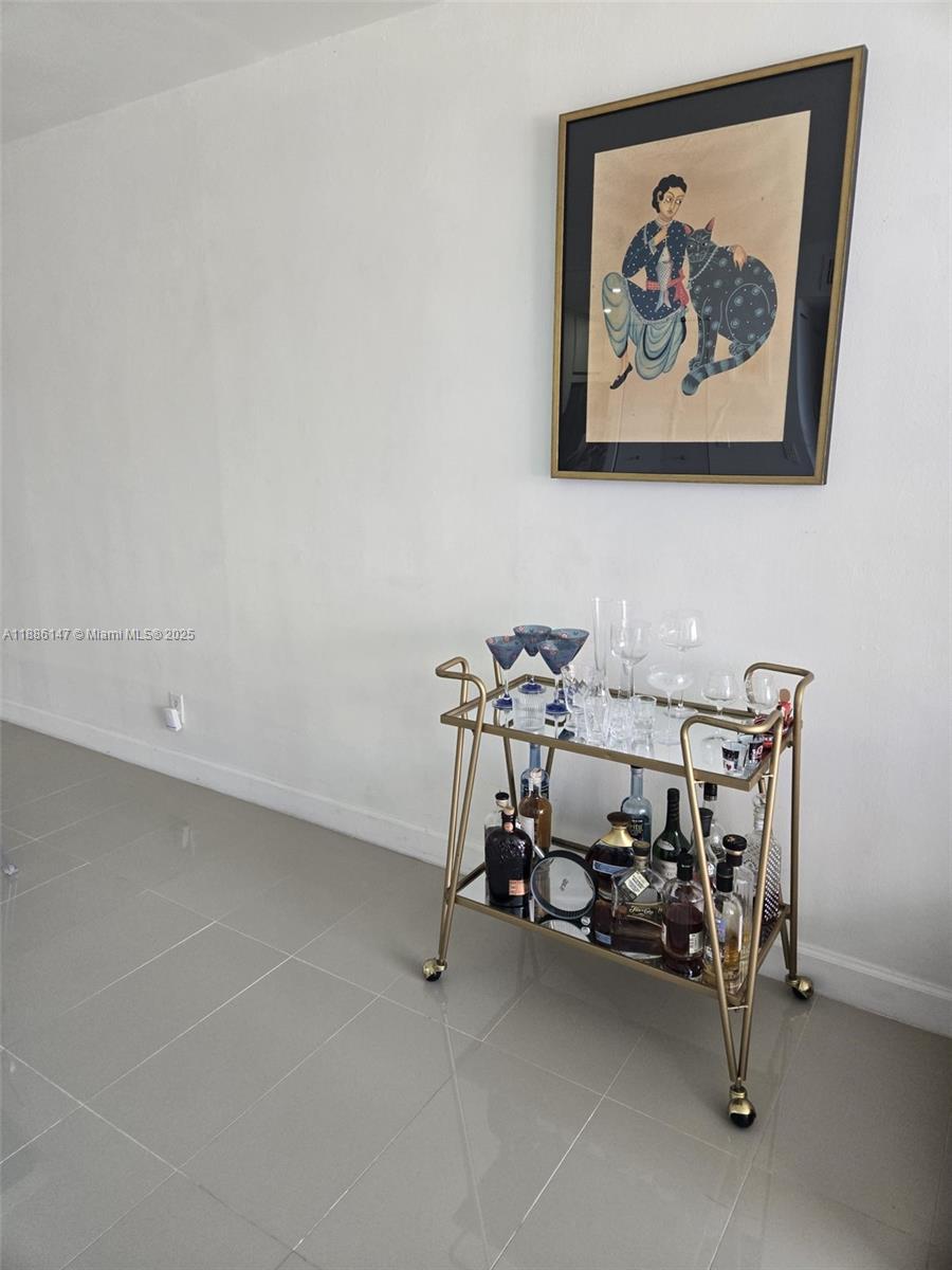 200 Southeast 15th Road, Unit 8J Miami, FL 33129 - Photo 2 of 20 a view of a room with gym equipment