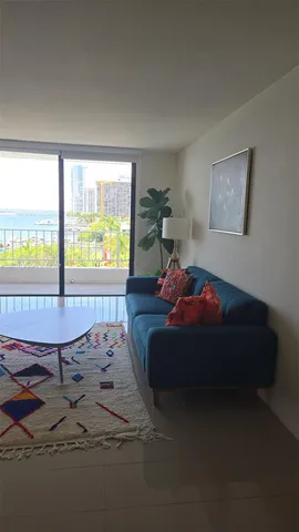 a room with furniture and a window