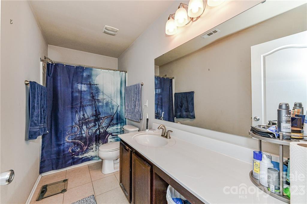 319 River Clay Road Fort Mill, SC 29708 - Photo 19 of 27 a bathroom with a sink and a mirror