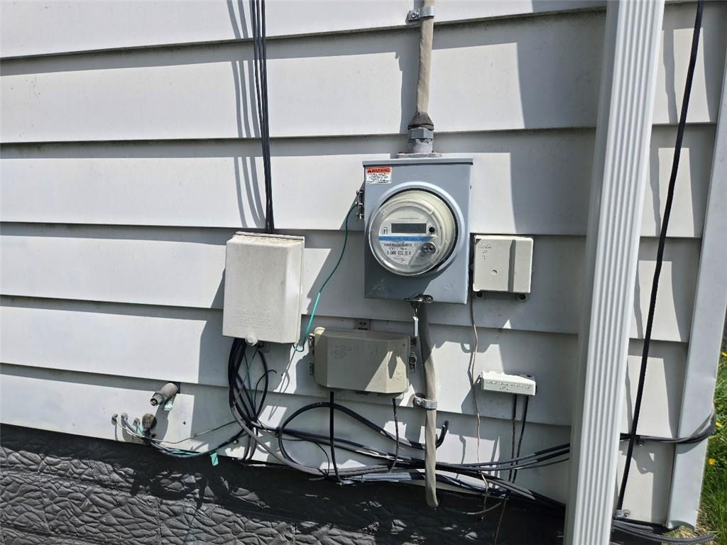 421 North Street Sharon, PA 16146 - Photo 3 of 10 a living room with chairs and view of kitchen view