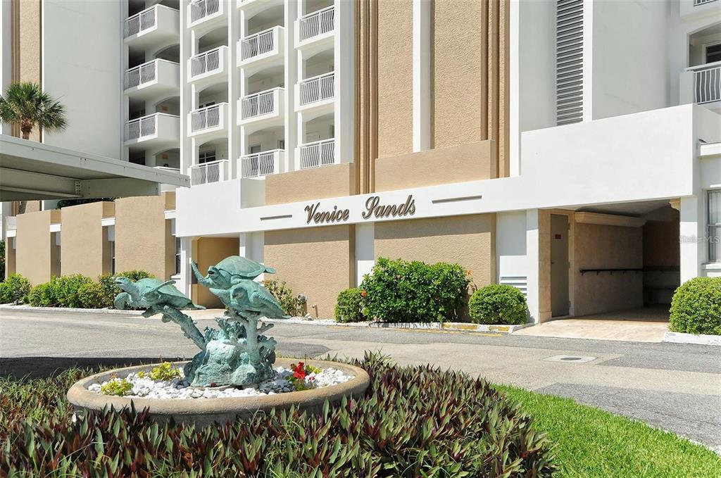 633 Alhambra Road, Unit 305 Venice, FL 34285 - Photo 2 of 43 a view of a patio with couches table and chairs and potted plants