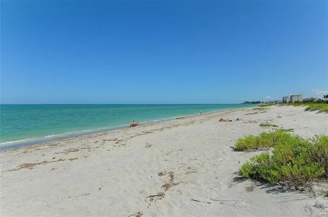 a view of a beach with a yard