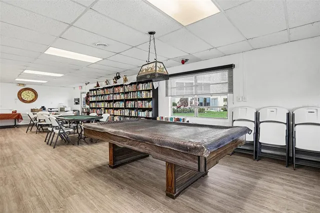 a view of a lake with outdoor space and seating