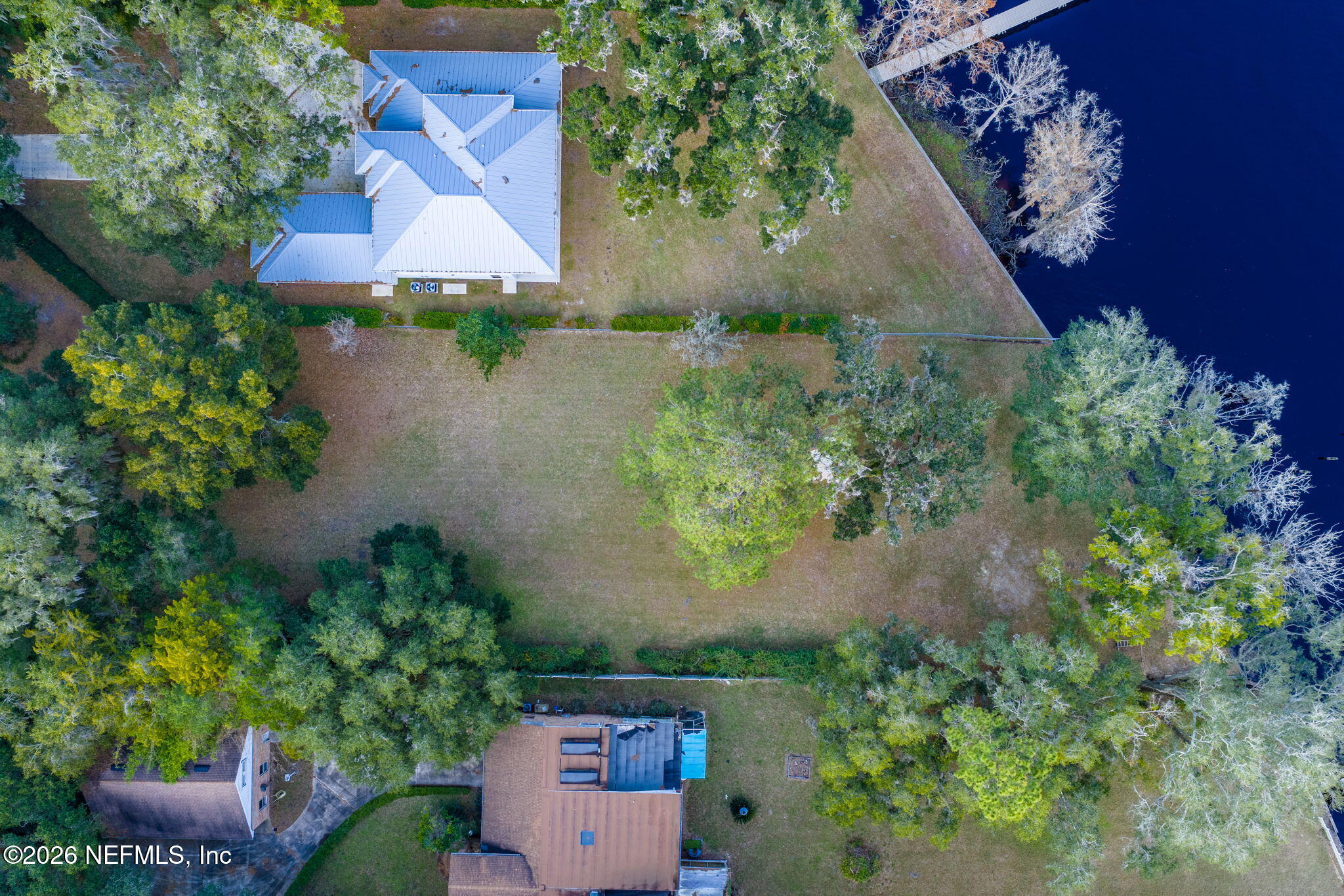3079 Anderson Road Green Cove Springs, FL 32043 - Photo 5 of 11 an aerial view of a house with a yard and garden