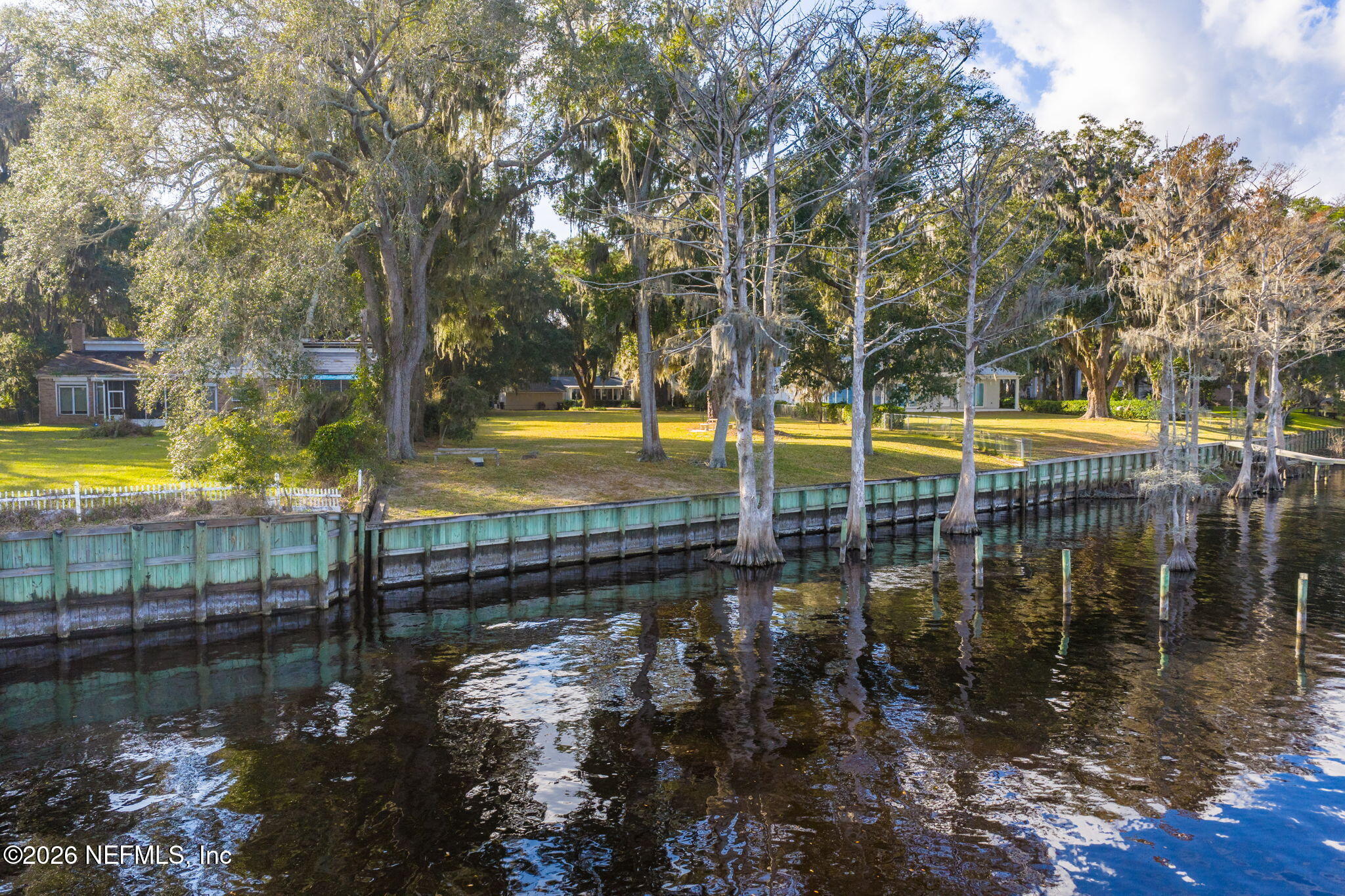 3079 Anderson Road Green Cove Springs, FL 32043 - Photo 8 of 11 a view of a swimming pool with an outdoor space and seating area