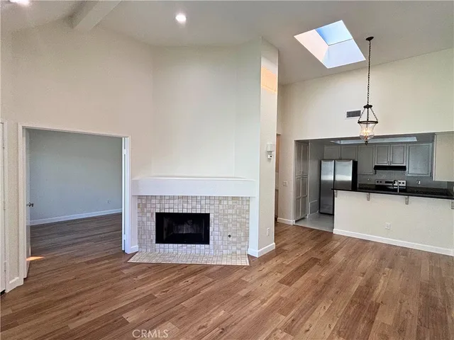 a view of a kitchen cabinets and a fireplace