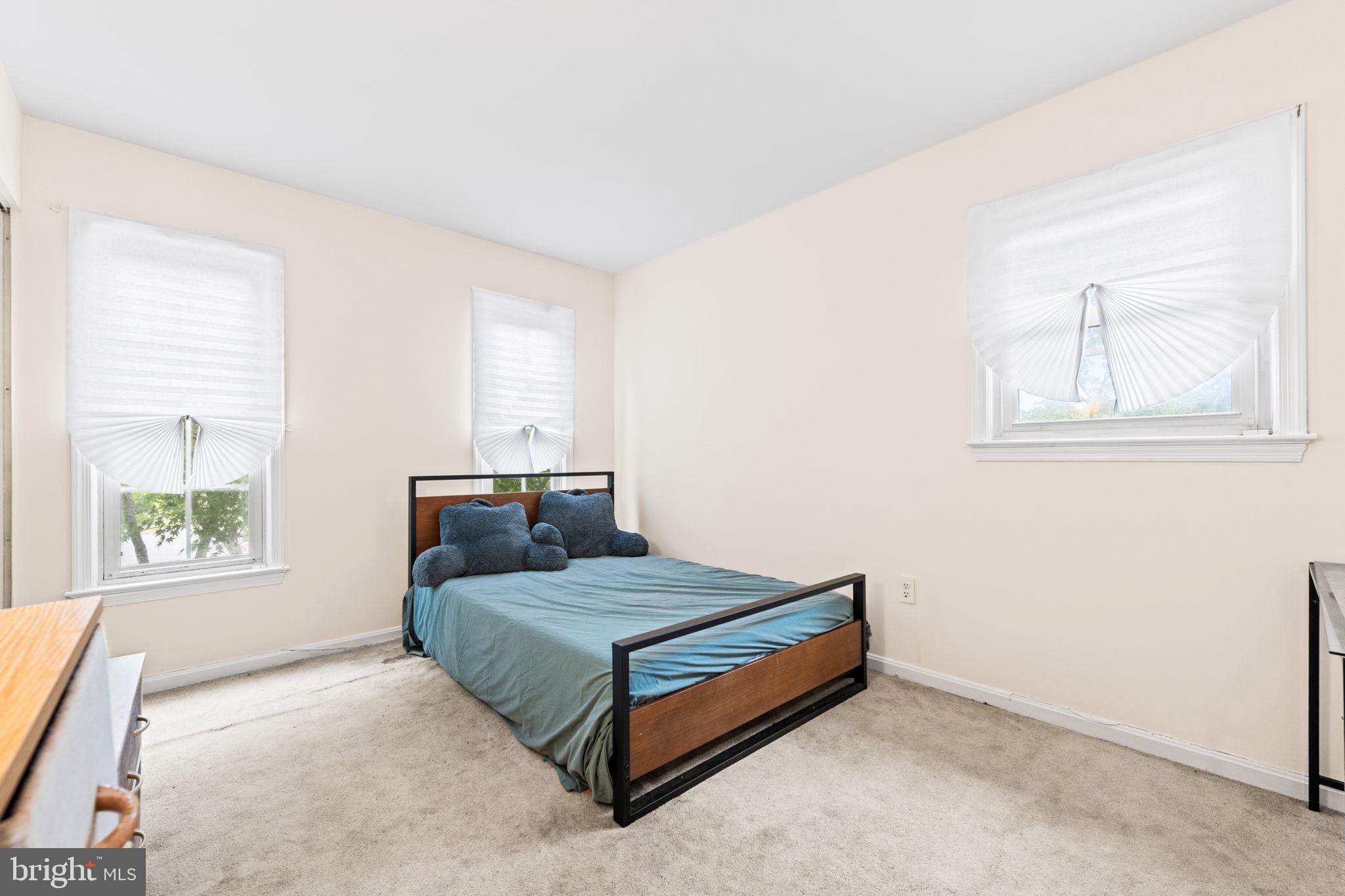 8000 Lady Lewis Court Springfield, VA 22153 - Photo 20 of 44 a bedroom with a bed and window