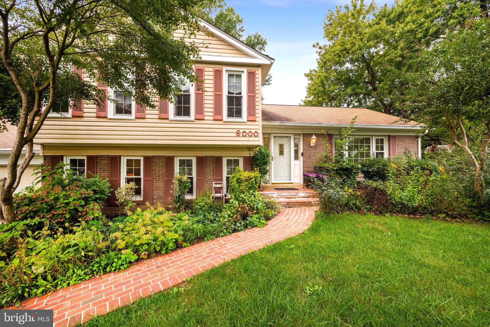 8000 Lady Lewis Court Springfield, VA 22153 - Photo 2 of 44 front view of a house with a yard