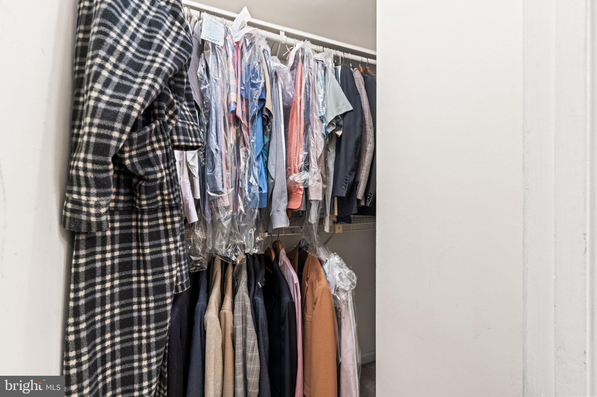 8000 Lady Lewis Court Springfield, VA 22153 - Photo 27 of 44 a view of walk in closet with clothes
