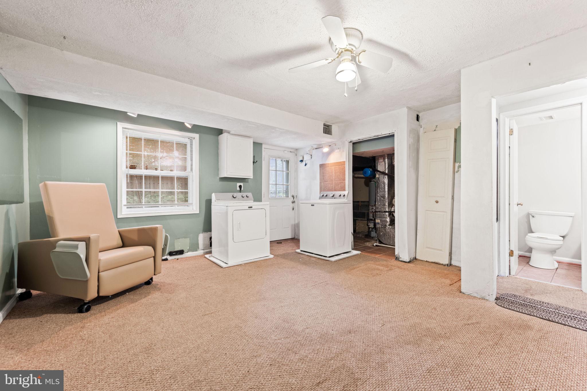 8000 Lady Lewis Court Springfield, VA 22153 - Photo 34 of 44 a view of livingroom with furniture and ceiling fan